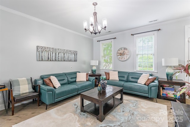 5623 Fetzer Ave NW, Concord, NC 28027 - living room with a chandelier, wood finished floors, and ornamental molding