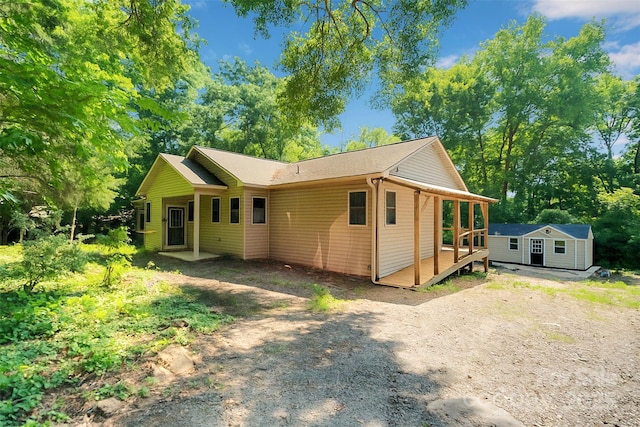 3333 Roberta Rd, Concord, NC 28027 - view of front of property with dirt driveway and a storage unit