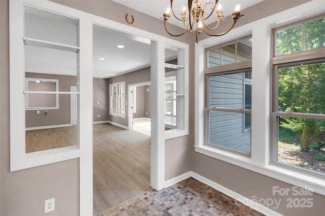 3333 Roberta Rd, Concord, NC 28027 - unfurnished sunroom featuring a chandelier