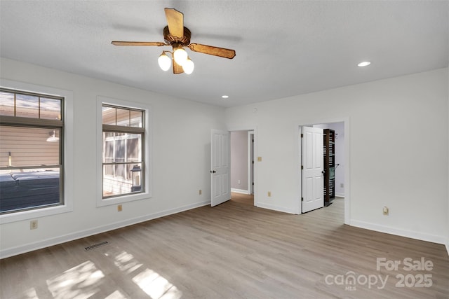 3333 Roberta Rd, Concord, NC 28027 - unfurnished bedroom with wood finished floors, recessed lighting, and ceiling fan