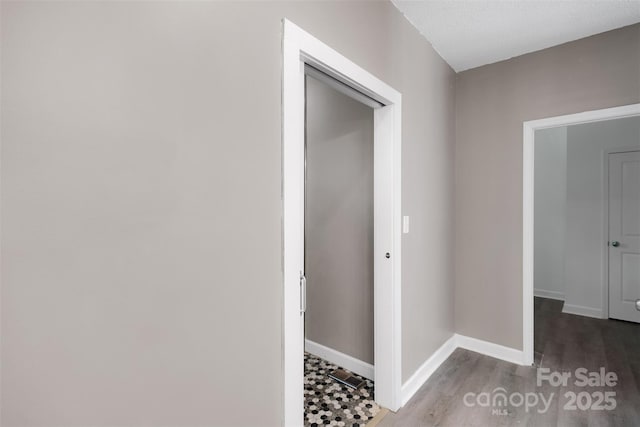 3333 Roberta Rd, Concord, NC 28027 - hall with baseboards and wood finished floors