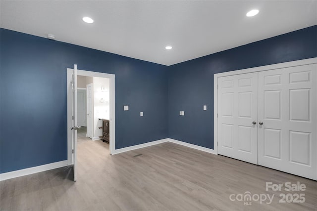 3333 Roberta Rd, Concord, NC 28027 - unfurnished bedroom featuring wood finished floors, a closet, and recessed lighting