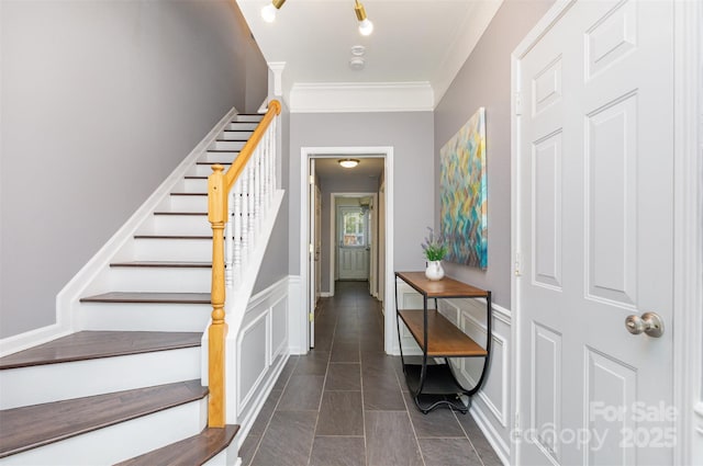 2945 Duvalla Ave, Charlotte, NC 28209 - entryway featuring stairway, ornamental molding, and a decorative wall