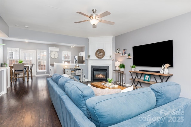 2945 Duvalla Ave, Charlotte, NC 28209 - living area featuring ceiling fan, dark wood-style floors, and a glass covered fireplace