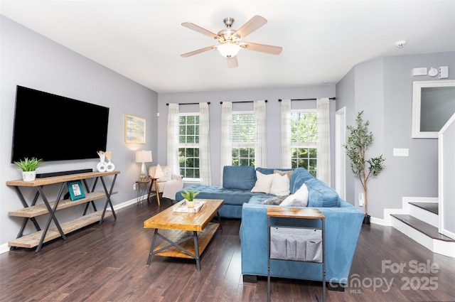 2945 Duvalla Ave, Charlotte, NC 28209 - living area featuring wood finished floors, ceiling fan, and stairway