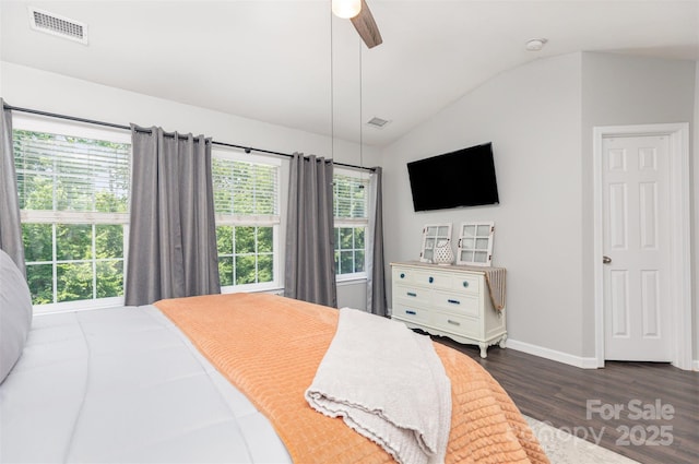 2945 Duvalla Ave, Charlotte, NC 28209 - bedroom with vaulted ceiling, dark wood-type flooring, and a ceiling fan