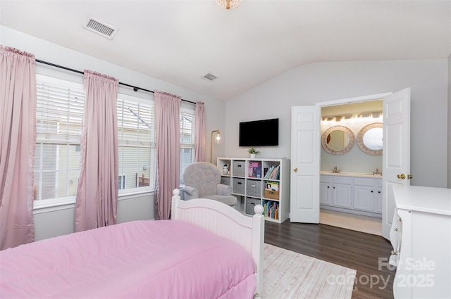 2945 Duvalla Ave, Charlotte, NC 28209 - bedroom with vaulted ceiling, dark wood-style flooring, and ensuite bathroom