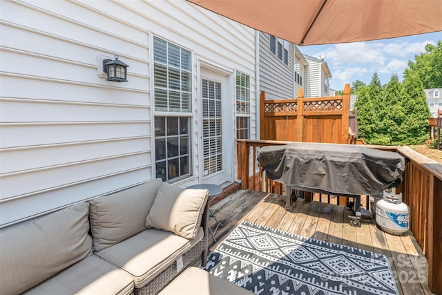 2945 Duvalla Ave, Charlotte, NC 28209 - wooden deck with outdoor lounge area and a grill