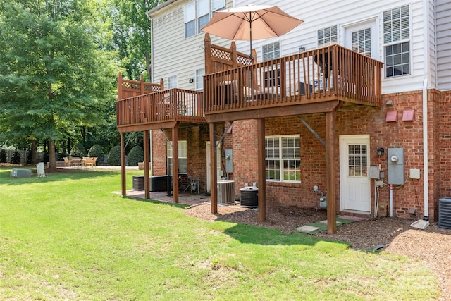 2945 Duvalla Ave, Charlotte, NC 28209 - back of house with a lawn, a wooden deck, and brick siding