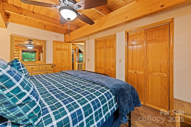 536 Tawodi Trl, Maggie Valley, NC 28751 - bedroom with wooden ceiling with exposed beams, multiple closets, wood finished floors, and ceiling fan