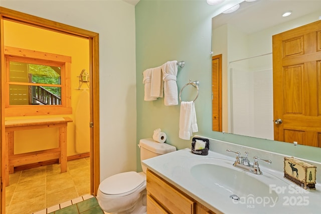 536 Tawodi Trl, Maggie Valley, NC 28751 - bathroom featuring vanity, toilet, tile patterned floors, and a shower