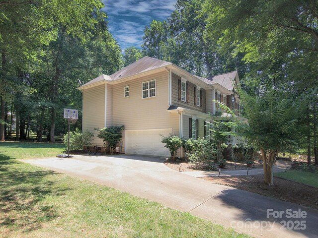 155 Culpeze Rd, Mooresville, NC 28117 - view of side of property with a garage, a lawn, and concrete driveway