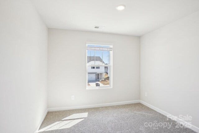 1423 Old Rivers Rd, Concord, NC 28027 - carpeted empty room with baseboards