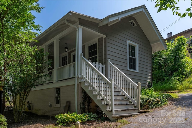 6 Wood Ave, Asheville, NC 28803 - view of side of property featuring stairs and a porch