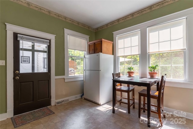 6 Wood Ave, Asheville, NC 28803 - kitchen featuring freestanding refrigerator and baseboards