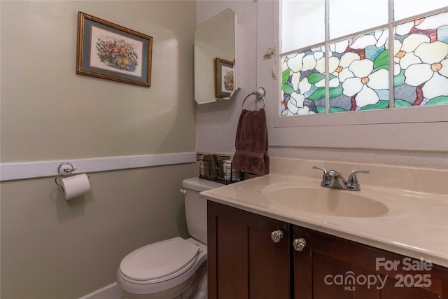6 Wood Ave, Asheville, NC 28803 - half bathroom featuring vanity and toilet