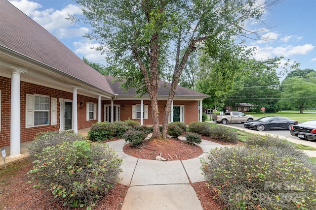 7012 Somerset Springs Dr Unit E, Charlotte, NC 28262 - view of front facade featuring brick siding