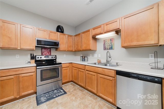 7012 Somerset Springs Dr Unit E, Charlotte, NC 28262 - kitchen featuring appliances with stainless steel finishes and light countertops