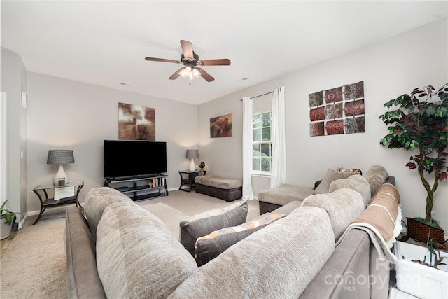 7012 Somerset Springs Dr Unit E, Charlotte, NC 28262 - living room with light carpet and ceiling fan