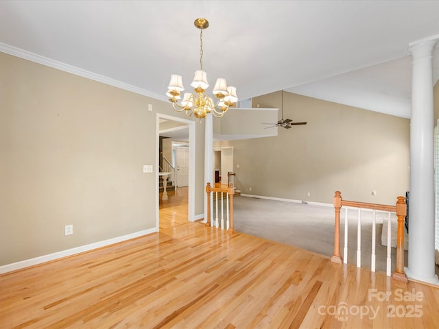 5104 Top Seed Ct, Charlotte, NC 28226 - unfurnished room featuring a chandelier, light wood-style floors, a ceiling fan, and ornamental molding