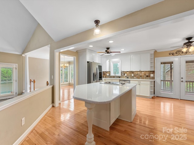 5104 Top Seed Ct, Charlotte, NC 28226 - kitchen featuring appliances with stainless steel finishes, ceiling fan, white cabinetry, backsplash, and recessed lighting