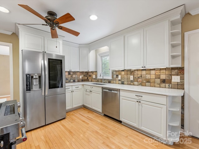 5104 Top Seed Ct, Charlotte, NC 28226 - kitchen featuring stainless steel appliances, open shelves, a ceiling fan, light countertops, and ornamental molding