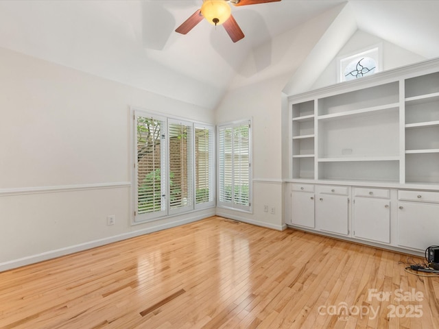 5104 Top Seed Ct, Charlotte, NC 28226 - unfurnished room featuring a ceiling fan, light wood-style flooring, and vaulted ceiling