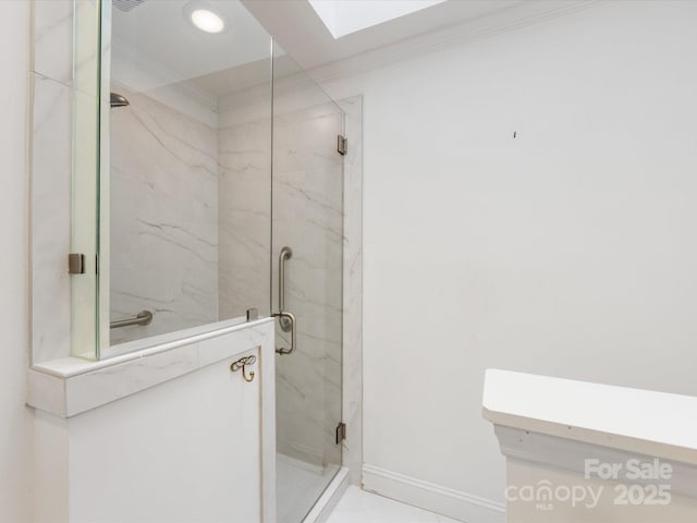 5104 Top Seed Ct, Charlotte, NC 28226 - bathroom with ornamental molding, a marble finish shower, and a skylight