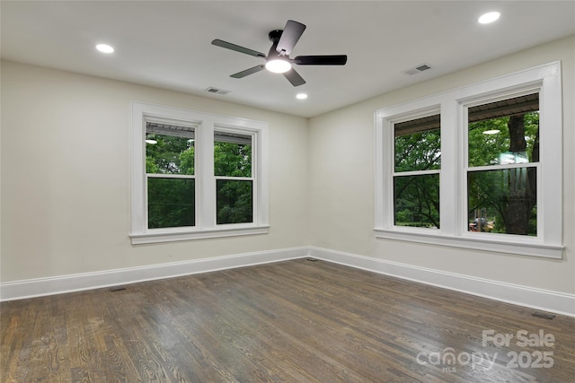 1783 Radio Station Rd, Newton, NC 28658 - empty room featuring baseboards, dark wood-style flooring, ceiling fan, and recessed lighting