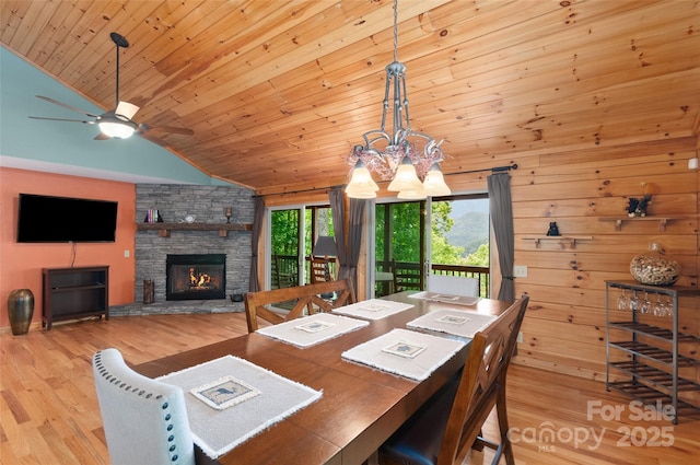 314 Prosperity Rdg, Waynesville, NC 28785 - dining room with vaulted ceiling, wood finished floors, wooden ceiling, a fireplace, and a ceiling fan