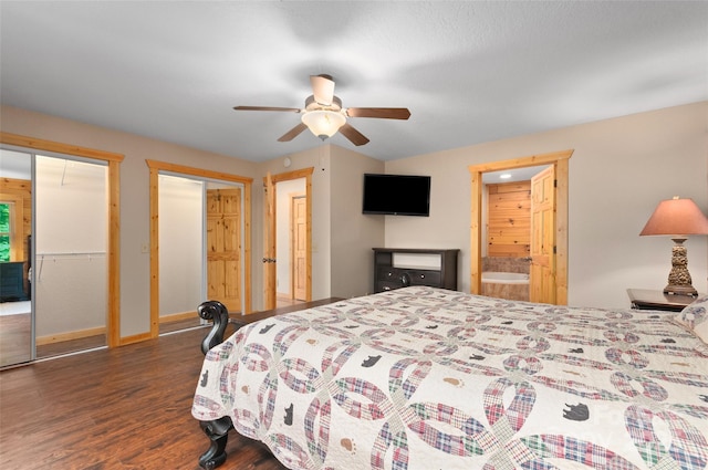 314 Prosperity Rdg, Waynesville, NC 28785 - bedroom featuring wood finished floors, multiple closets, baseboards, a ceiling fan, and ensuite bath