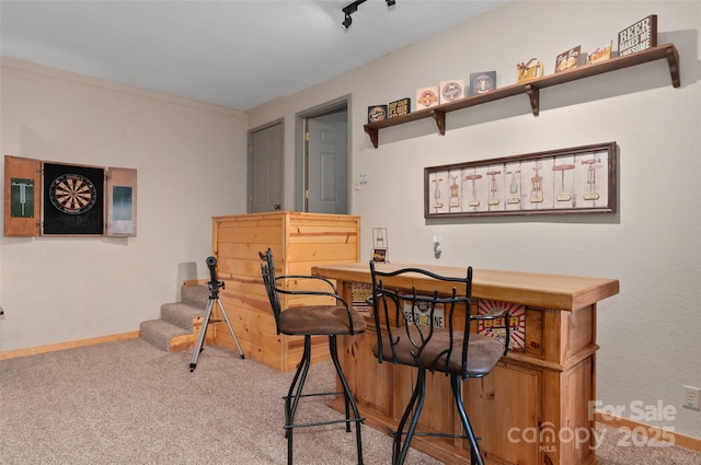 314 Prosperity Rdg, Waynesville, NC 28785 - dining room with carpet floors, baseboards, stairs, and a dry bar