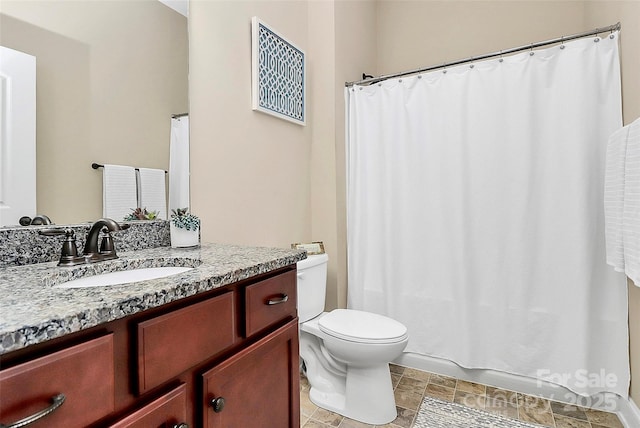 1397 Tupelo Rd, Clover, SC 29710 - full bath featuring vanity, toilet, and stone finish flooring