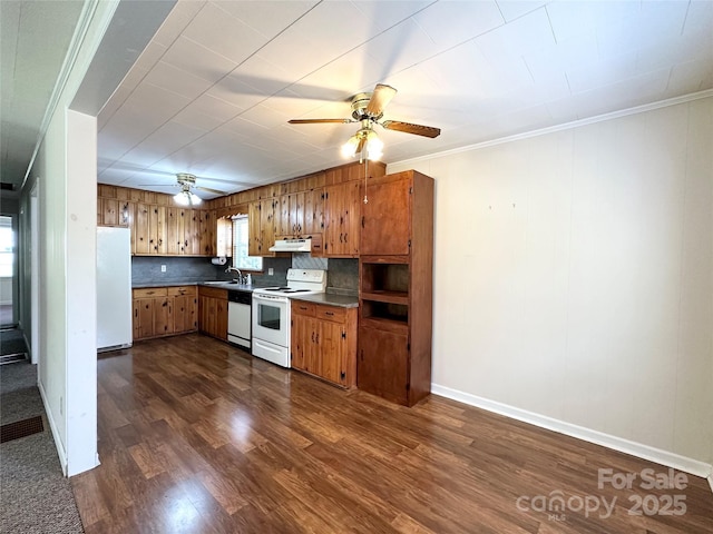 820 NE Seehorn St NE, Lenoir, NC 28645 - kitchen featuring white appliances, under cabinet range hood, a ceiling fan, dark countertops, and brown cabinets