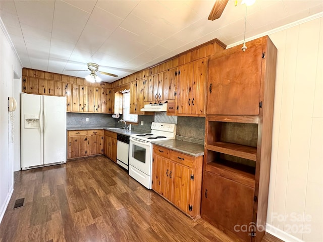 820 NE Seehorn St NE, Lenoir, NC 28645 - kitchen featuring white appliances, ceiling fan, under cabinet range hood, brown cabinets, and dark wood-type flooring