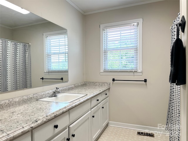 820 NE Seehorn St NE, Lenoir, NC 28645 - full bathroom with vanity, baseboards, crown molding, and tile patterned floors