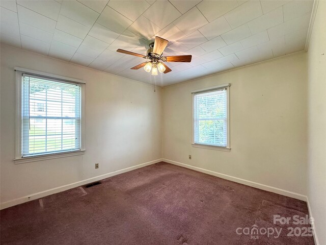 820 NE Seehorn St NE, Lenoir, NC 28645 - carpeted spare room featuring a ceiling fan and baseboards