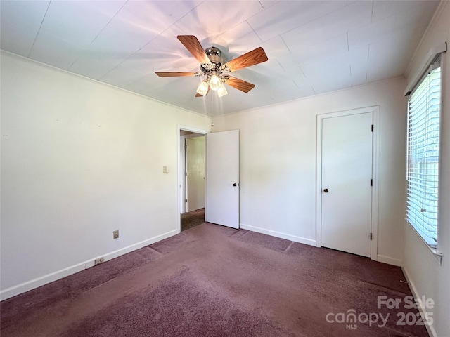 820 NE Seehorn St NE, Lenoir, NC 28645 - unfurnished bedroom featuring carpet, baseboards, and ceiling fan