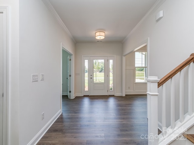 7108 Hambright Rd, Huntersville, NC 28078 - entryway with dark wood-type flooring, stairway, and ornamental molding