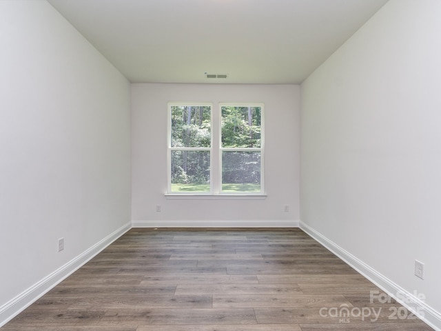 7108 Hambright Rd, Huntersville, NC 28078 - spare room with baseboards and wood finished floors