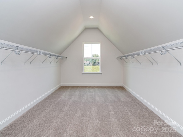 7108 Hambright Rd, Huntersville, NC 28078 - walk in closet with vaulted ceiling and carpet