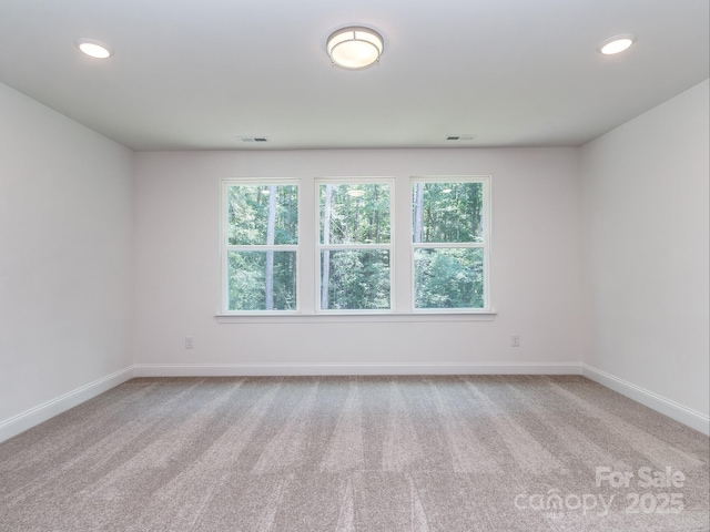 7108 Hambright Rd, Huntersville, NC 28078 - carpeted empty room featuring healthy amount of natural light, baseboards, and recessed lighting
