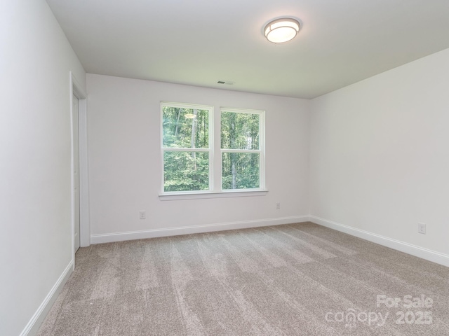 7108 Hambright Rd, Huntersville, NC 28078 - carpeted spare room featuring baseboards