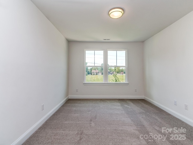 7108 Hambright Rd, Huntersville, NC 28078 - carpeted spare room featuring baseboards