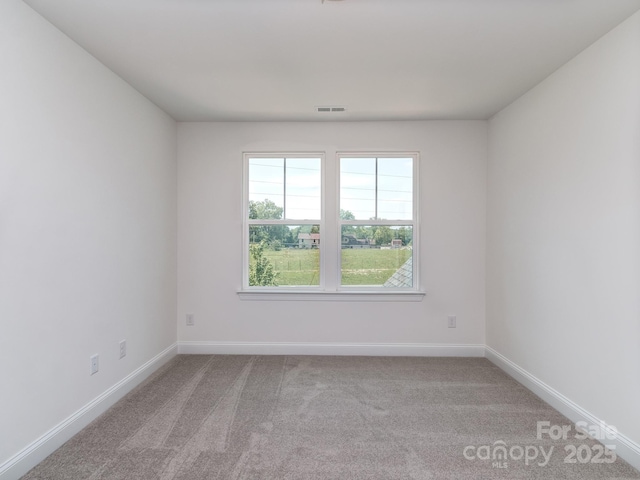 7108 Hambright Rd, Huntersville, NC 28078 - empty room featuring light colored carpet and baseboards