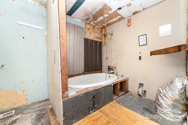 245 Walt Corriher Rd, China Grove, NC 28023 - full bathroom with a tub with marble appearance