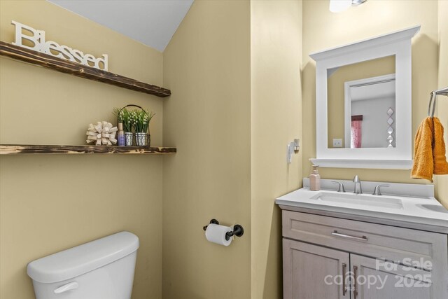 301 Wheat Field Dr, Mount Holly, NC 28120 - bathroom featuring toilet and vanity