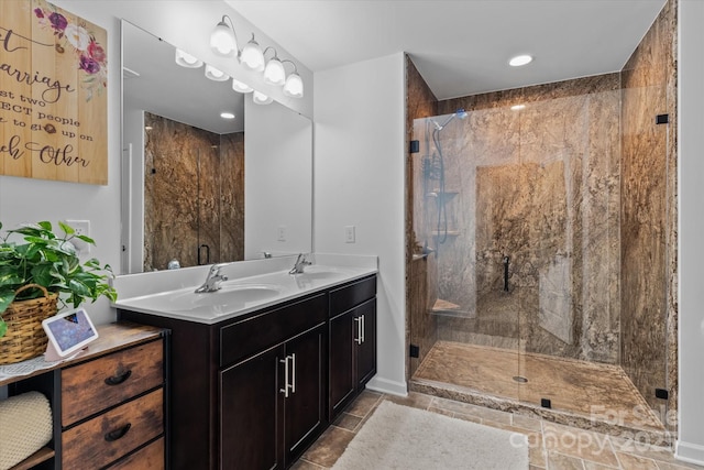 301 Wheat Field Dr, Mount Holly, NC 28120 - bathroom featuring a marble finish shower, double vanity, recessed lighting, and baseboards