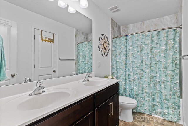 301 Wheat Field Dr, Mount Holly, NC 28120 - full bath with toilet, double vanity, and a shower with shower curtain