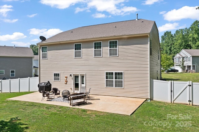 301 Wheat Field Dr, Mount Holly, NC 28120 - back of house with a gate and a patio area